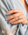 Lakier hybrydowy GELme ONE Coat Blue Mistic 347 w stylizacji paznokci