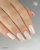 Lakier hybrydowy GELme ONE Coat Latte Macchiato w stylizacji paznokci