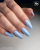 Lakier hybrydowy GELme ONE Coat Blue Clue w stylizacji paznokci.